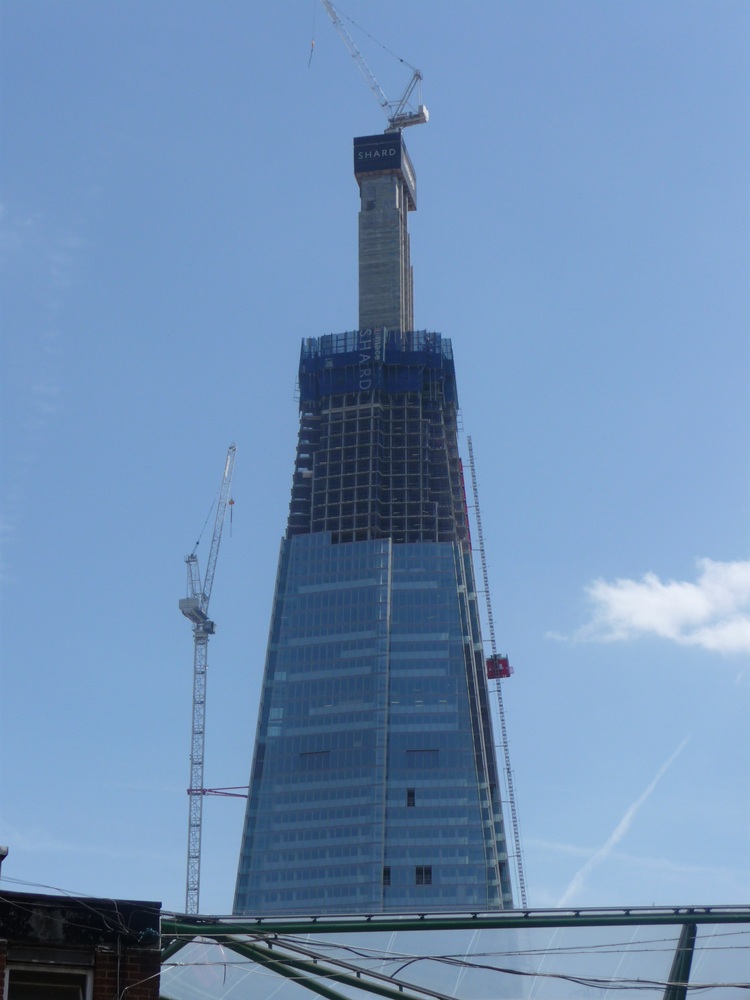 A tall building under constructionDescription automatically generated with medium confidence